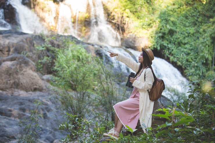 female tourists are walking nature 1150 7584